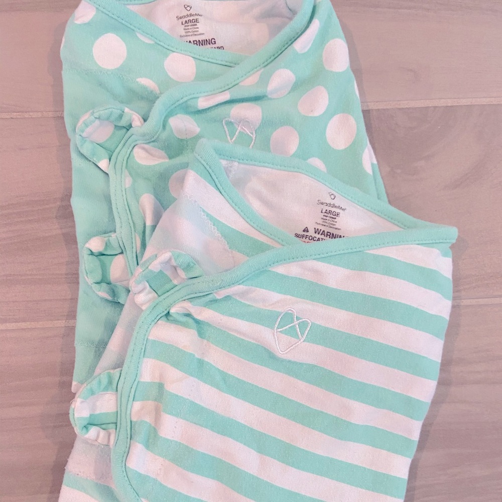 Two swaddle me Velcro swaddles